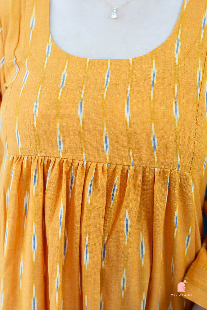 Ananta Empire Waist Dress in Apricot